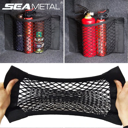 Mesh storage net in a car trunk with brand logo