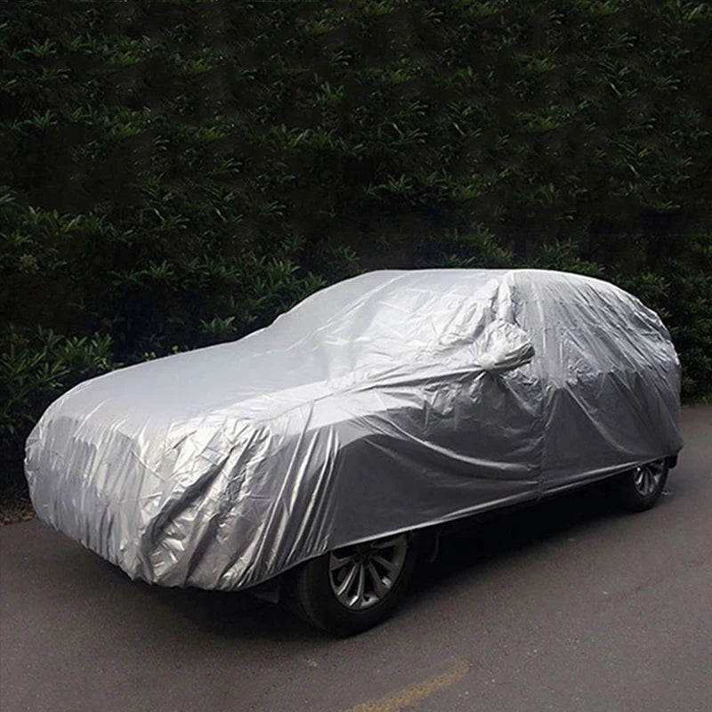 Silver full car cover on an SUV