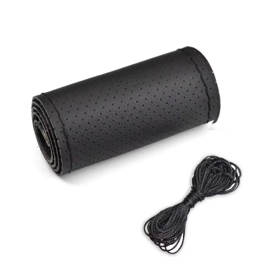 Rolled steering wheel cover with black thread