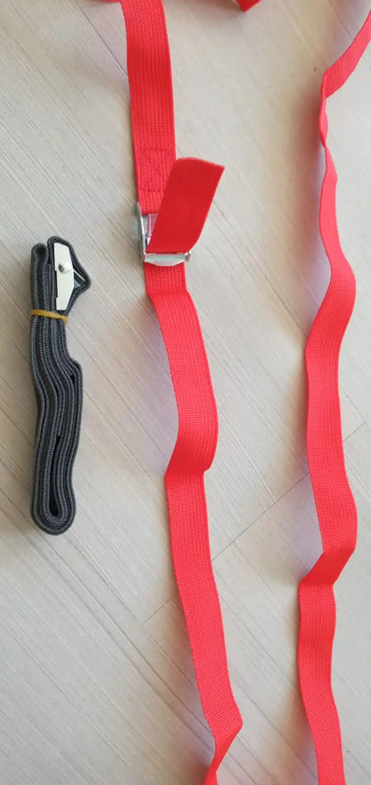 Red tie-down strap with buckle