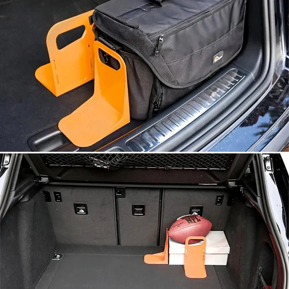 Orange holders keeping bags and boxes in place in a car trunk