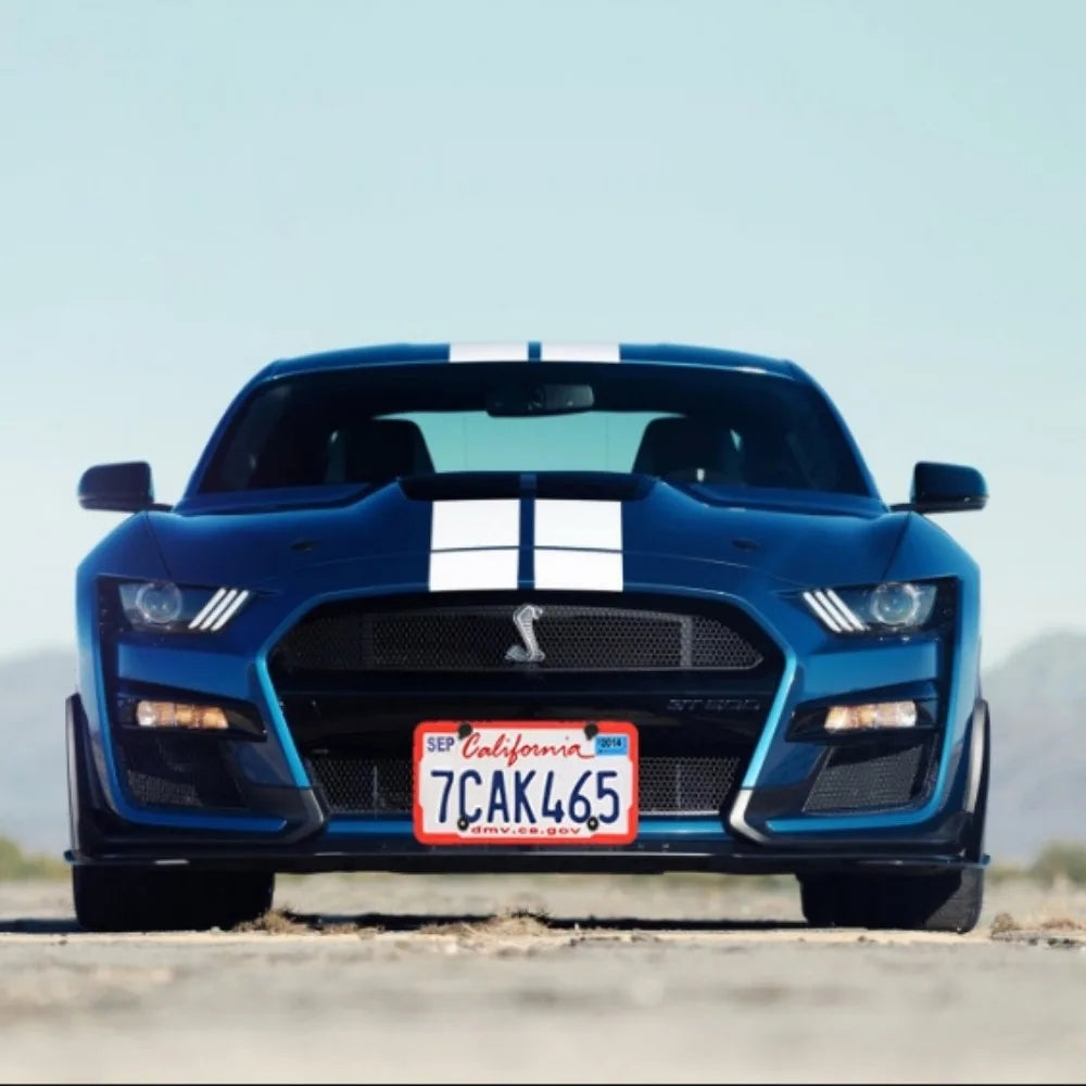Blue silicone license plate frame on a sports car
