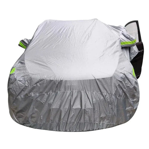 Two-tone silver car cover with reflective strips on an SUV, front view