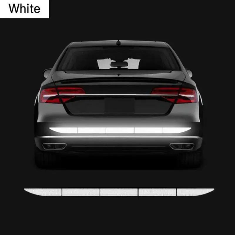 White reflective strip on the rear bumper of a car
