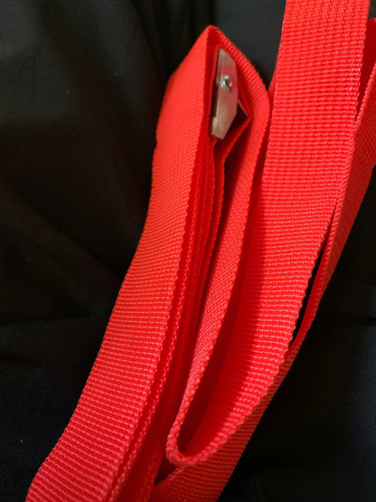 Close-up of a red tie-down strap