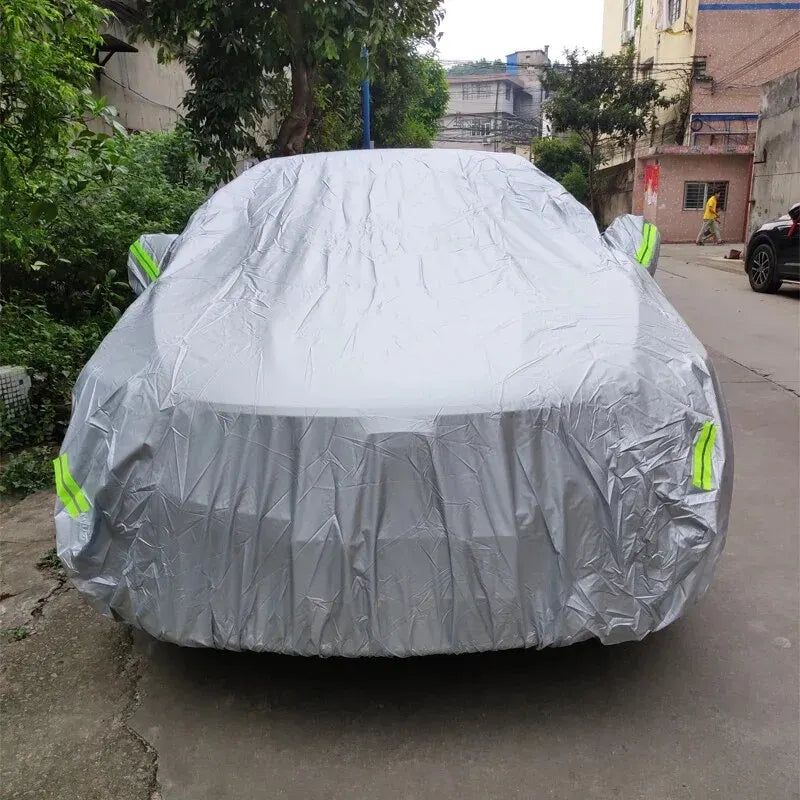 Two-tone silver car cover on a car, rear view
