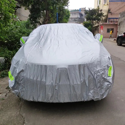 Two-tone silver car cover on a car, rear view
