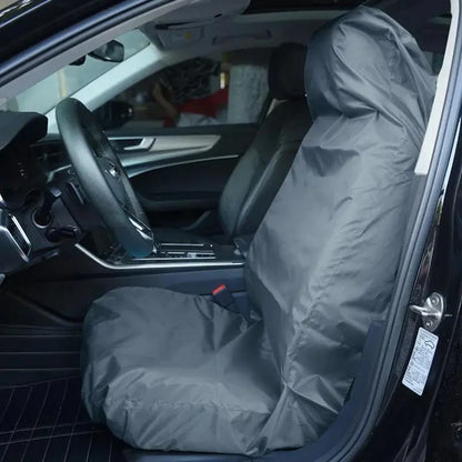 Black waterproof seat protector on a front car seat