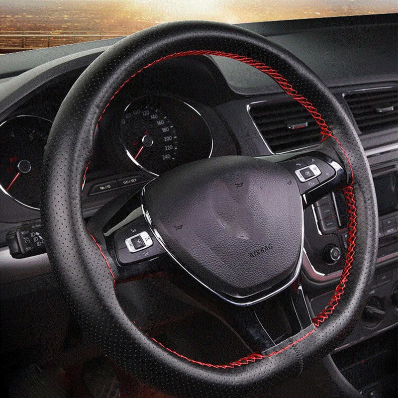 Finished hand-stitched steering wheel cover in a car