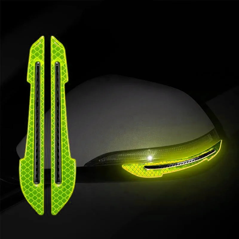 Green reflective strips on a car side mirror