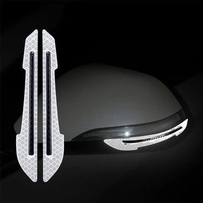 White reflective strips on a car side mirror