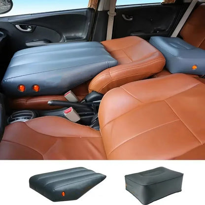 Inflatable slope pad filling the rear footwell gap
