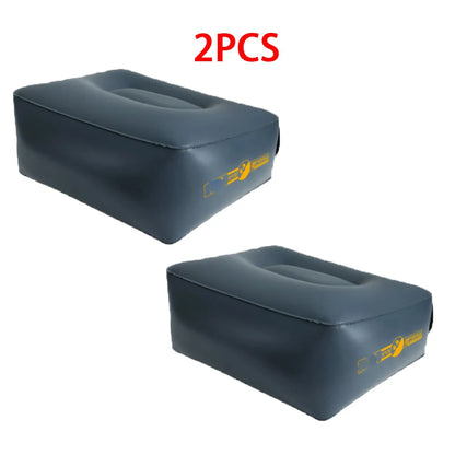 Two small sloped cushions