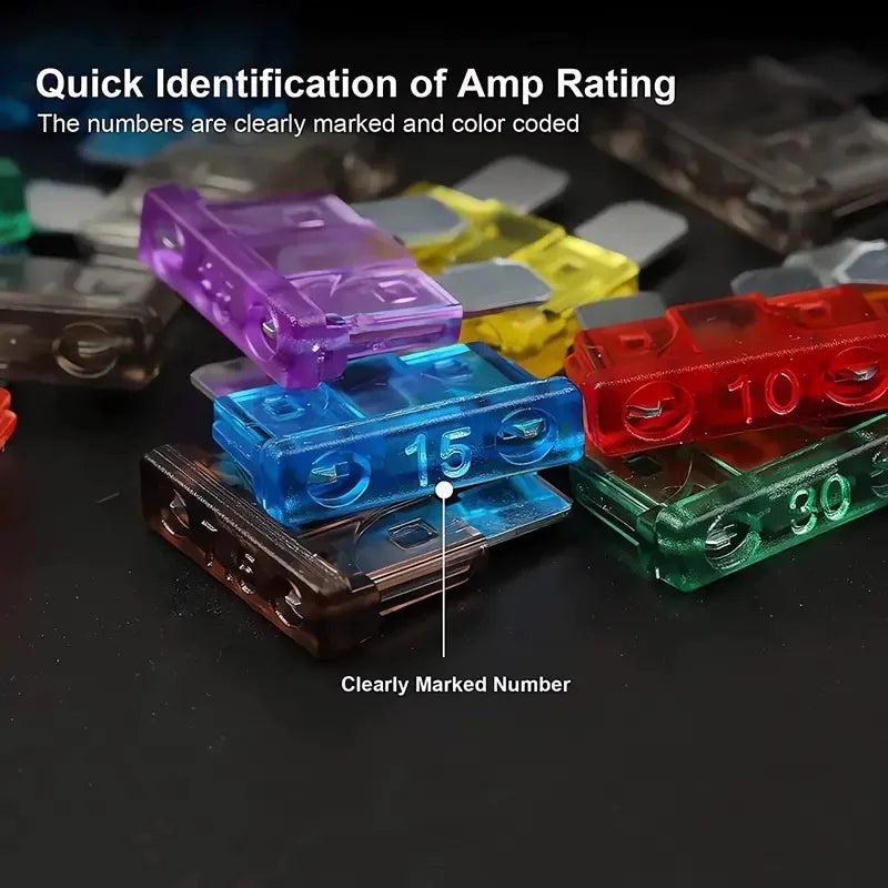 Close-up of color-coded blade fuses with the amp rating printed on top