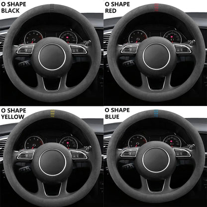 O shape suede covers with black, red, yellow and blue stitch markers on steering wheels