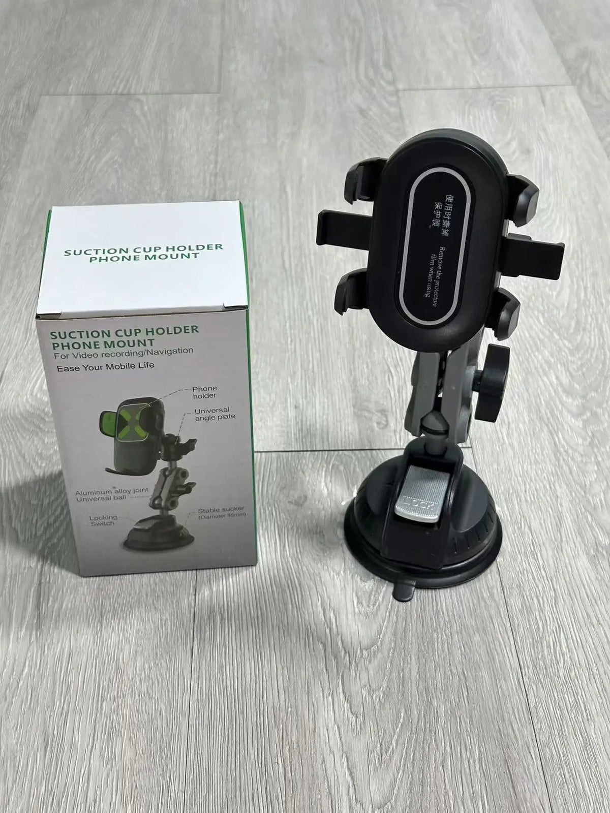 Short-arm version of the suction cup phone mount with its box
