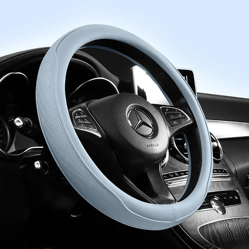 Light blue perforated steering wheel cover