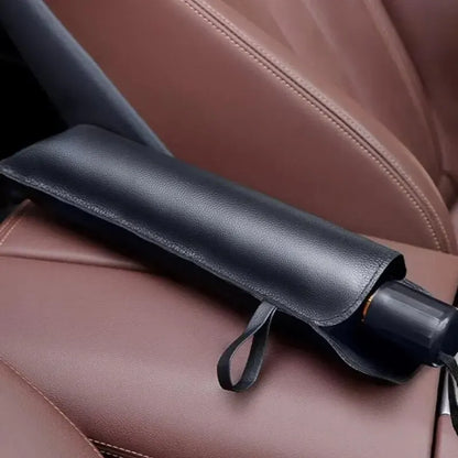 Closed umbrella sun shade in its storage case on a car seat