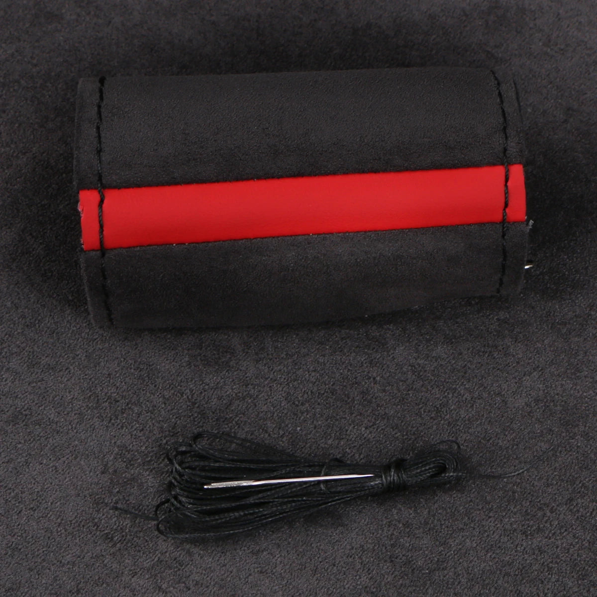 Faux suede cover with red stripe and black thread