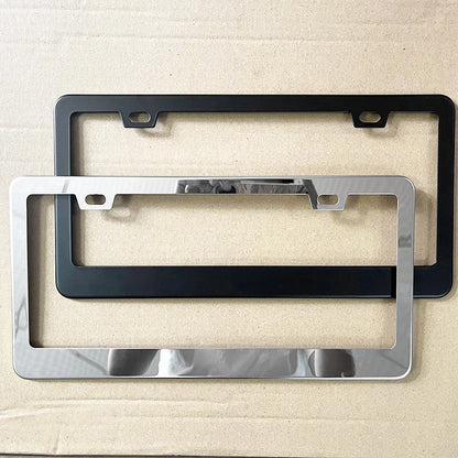 Black and silver license plate frames