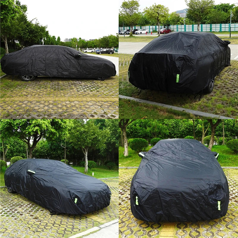 Black car cover on cars parked outdoors