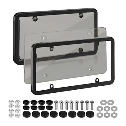 Two black license plate frames with light smoke covers and screw kit
