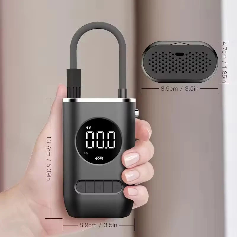 Handheld cordless tire inflator shown in hand with its dimensions