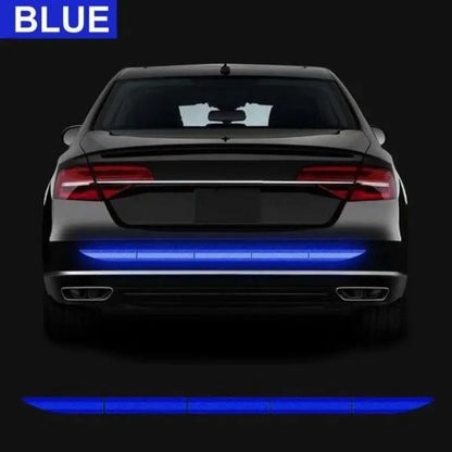 Blue reflective strip on the rear bumper of a car