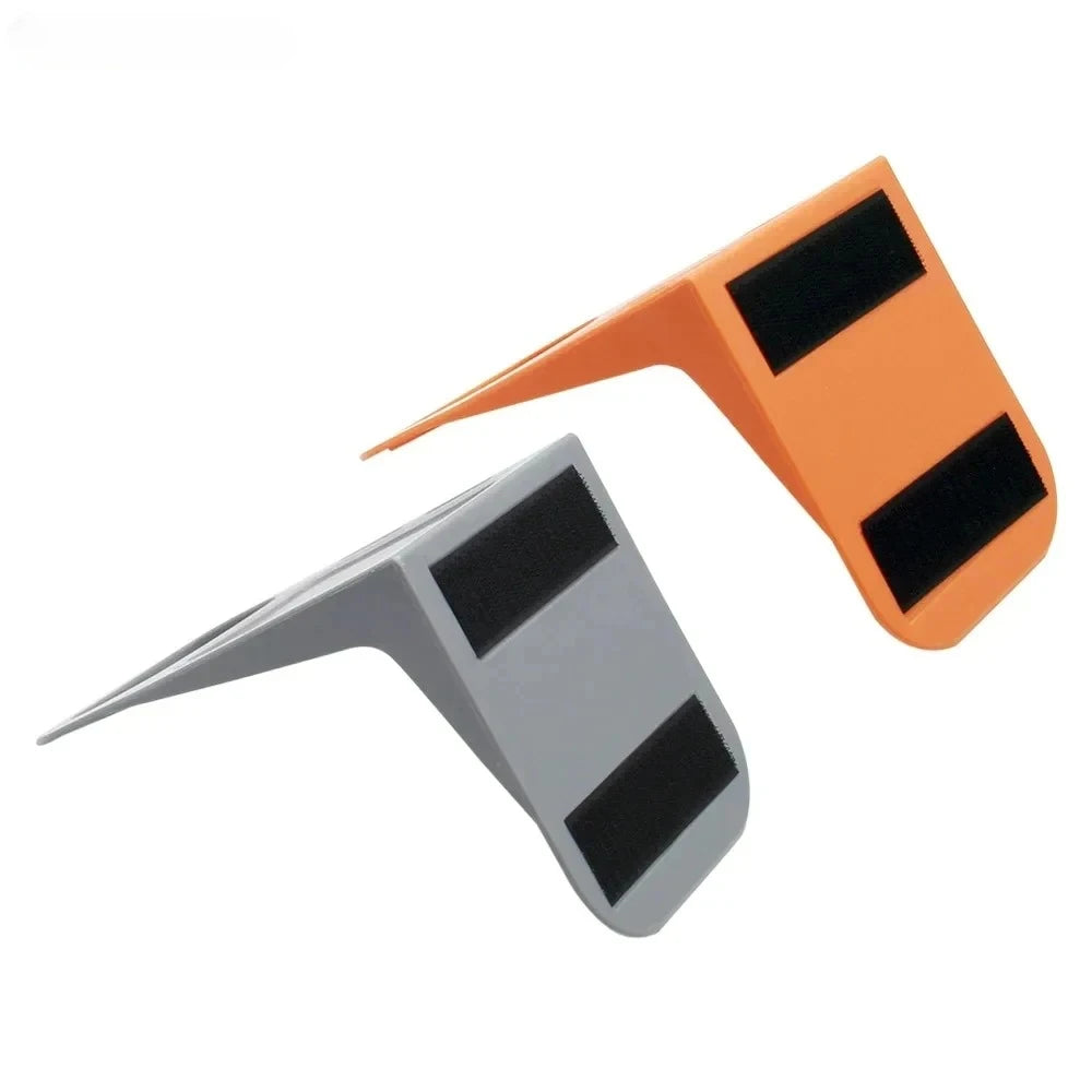 Hook-and-loop pads on the base of the holder