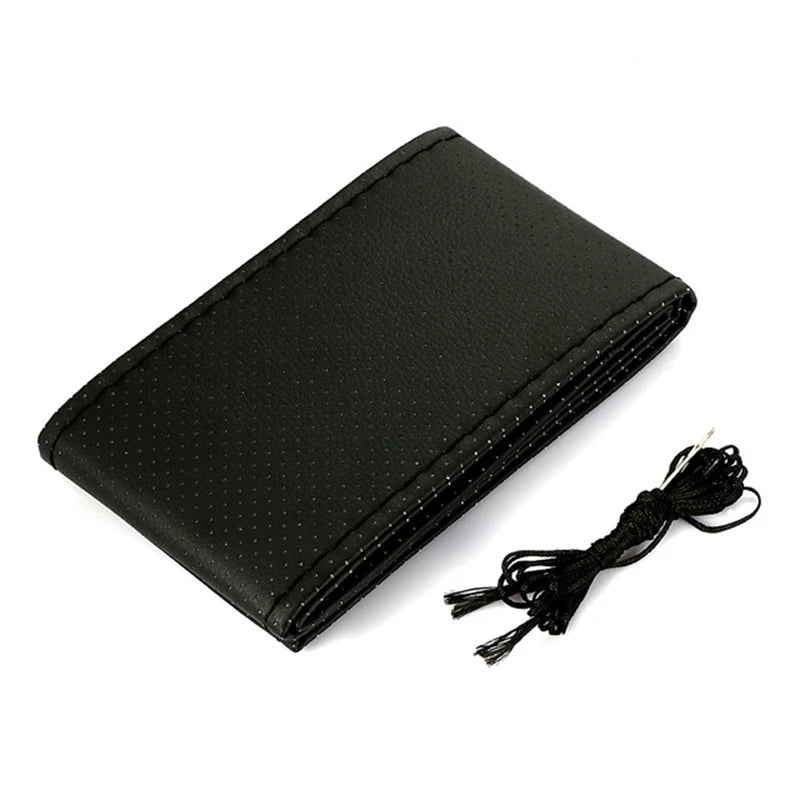 Black faux leather steering wheel cover with black thread